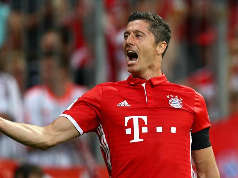 Robert Lewandowski celebrates after scoring one of the goals