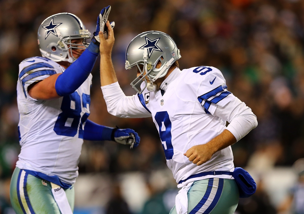 PHILADELPHIA PA- DECEMBER 14 Tony Romo #9 of the Dallas Cowboys high fives Jason Witten #82 after a touchdown in the first quarter against the Philadelphia Eagles at Lincoln Financial Field