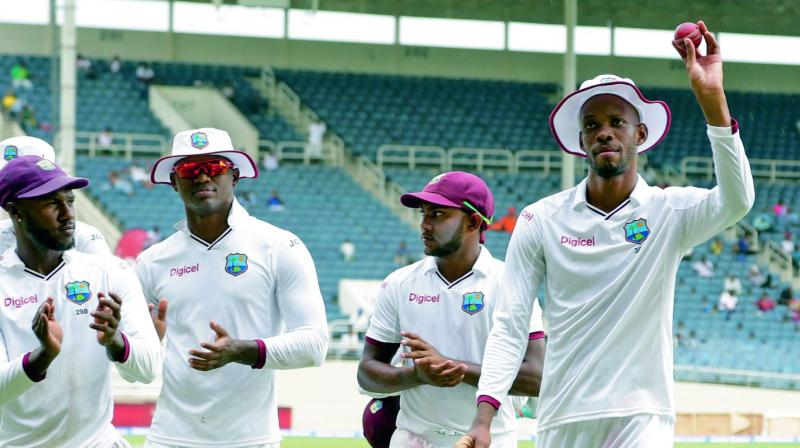 Roston Chase acknowledges the crowd after his five-for on Monday