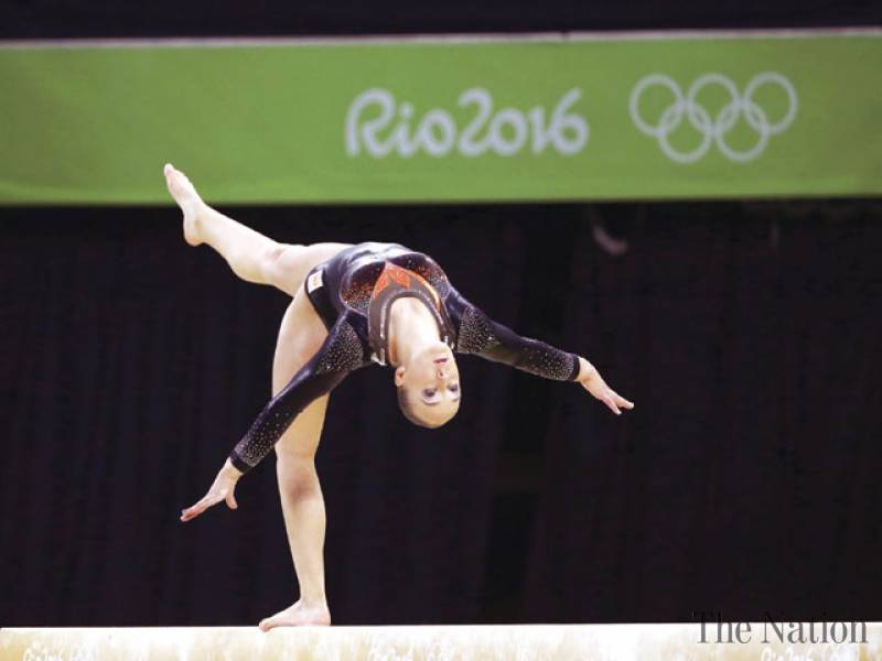 Biles's five gold bid ends as Wevers wins beam