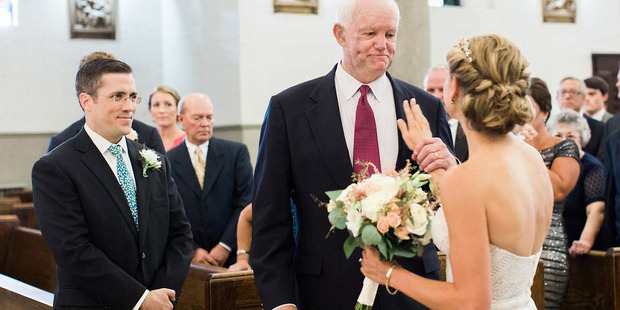 Stepien touches Thomas chest where her father's heart is beating right before she turns toward her groom