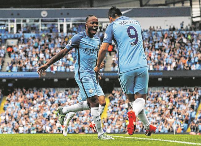 Man City maintain perfect start