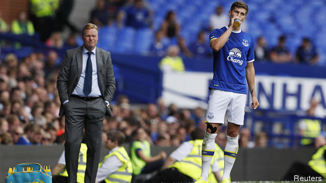 Everton manager Ronald Koeman and John Stones