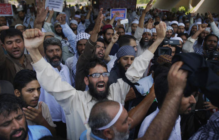 Supporters of All Parties Hurriyat Conference chant anti India slogans during rally in Islamabad Pakistan on Wednesday. — AP