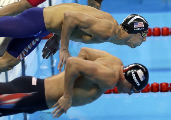 United States&#039 Michael Phelps top and United States&#039 Ryan Lochte compete in a semifinal of the men's 200-meter individual medley during the swimming competitions at the 2016 Summer Olympics Wednesday Aug. 10 2016 in Rio de Janeiro Br