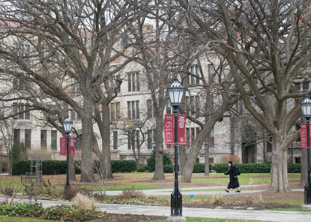 499277772-pedestrian-walks-through-the-main-quadrangles-on-the