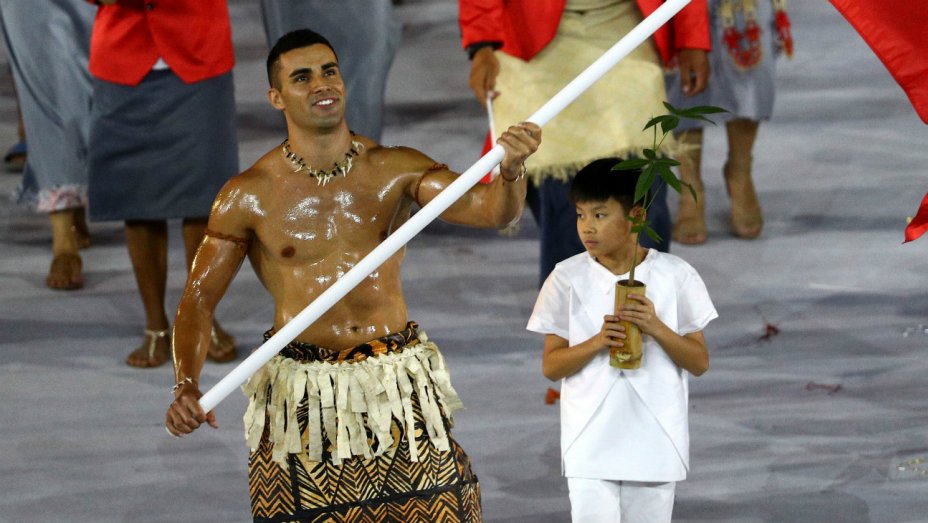 Tongan flag bearer draws a lot of attention during opening ceremony