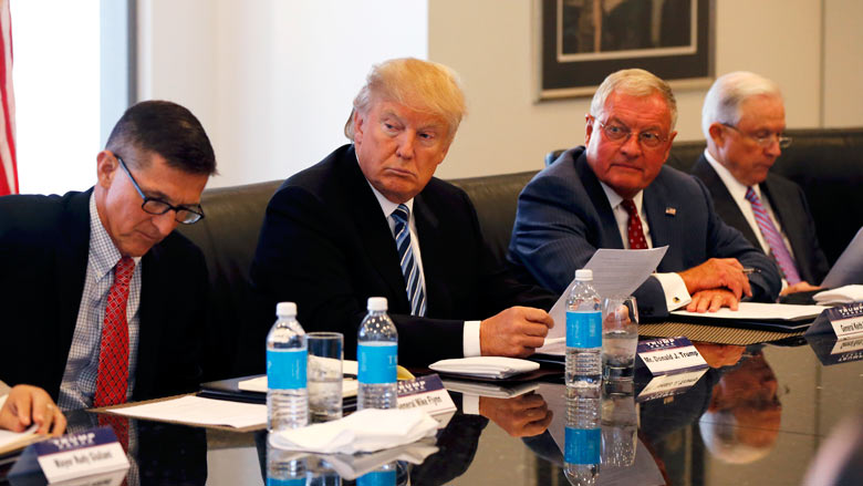 Republican presidential candidate Donald Trump participates in a roundtable discussion on national security in his offices in Trump Tower in New York Wednesday Aug. 17 2016. From left are Ret. Army Gen. Mike Flynn Trump Ret. Army Lt. Gen. Keith Kel