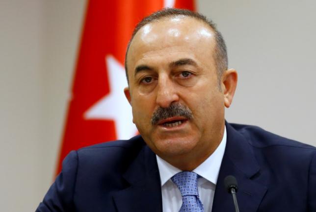 Turkey's Foreign Minister Mevlut Cavusoglu addresses the media in Ankara Turkey