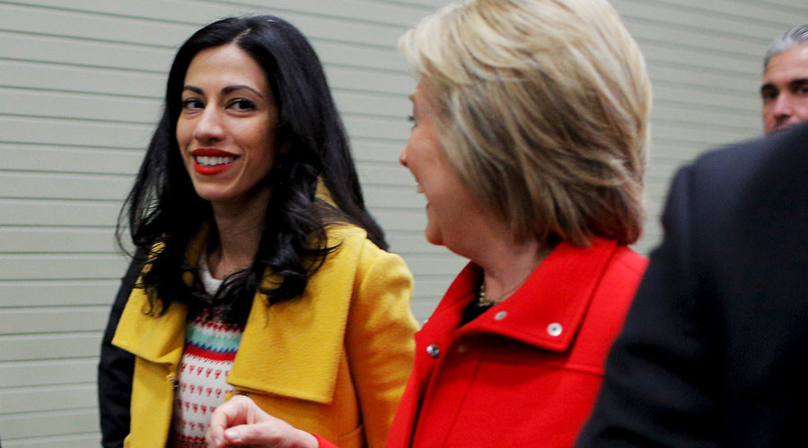 U.S. Democratic presidential candidate Hillary Clinton and her aide Huma Abedin