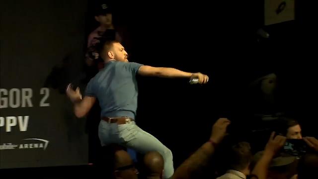 McGregor Diaz supports duke it out in water bottle fight