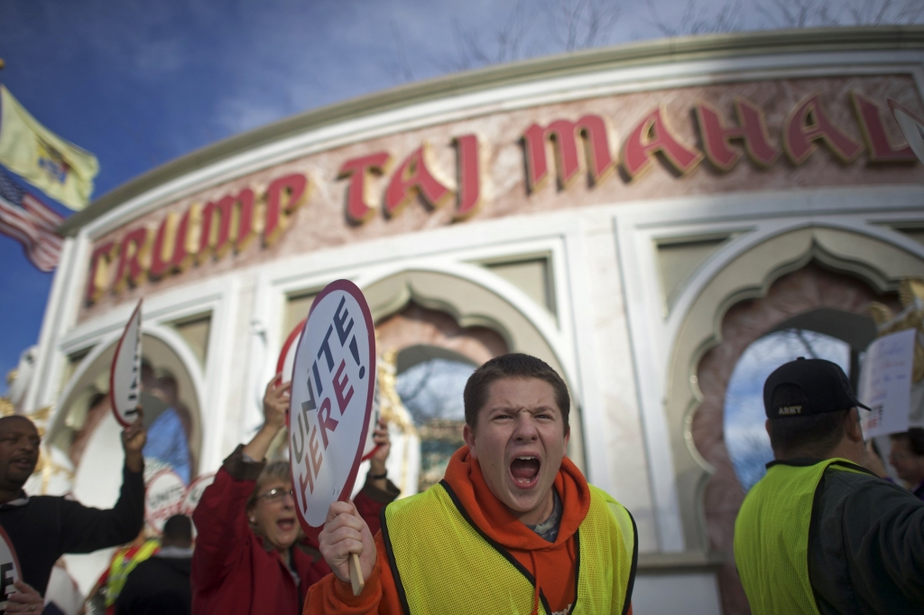 Union members from UNITE HERE Local 54 rally outside the Trump Taj Mahal Casino in Atlantic City New Jersey