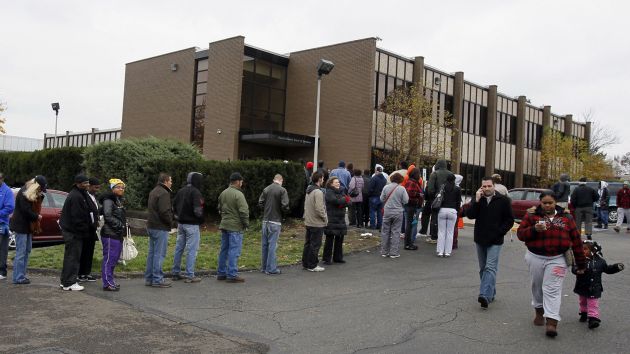 Voters wait for hours in long lines to cast ballots in Summit County Ohio in 2012. Paul Tople  Zuma