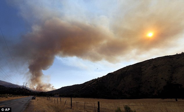 Fire officials in southern California say a car driven by a woman high on drugs has sparked several wildfires that so far have burned 450 acres and prompted evacuations