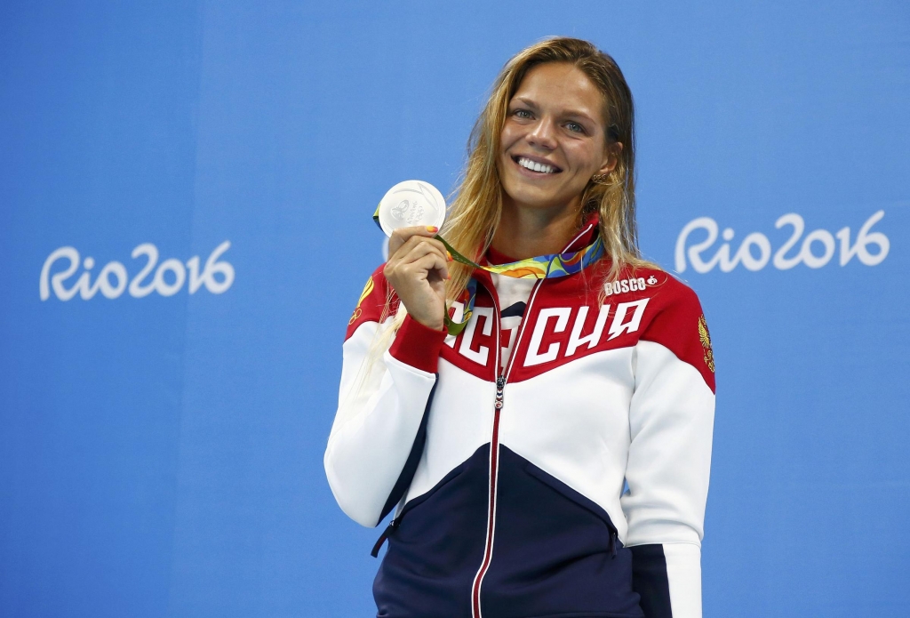 Yulia Efimova of Russia poses with her silver medal at the Rio Olympics.
   David Gray  Reuters