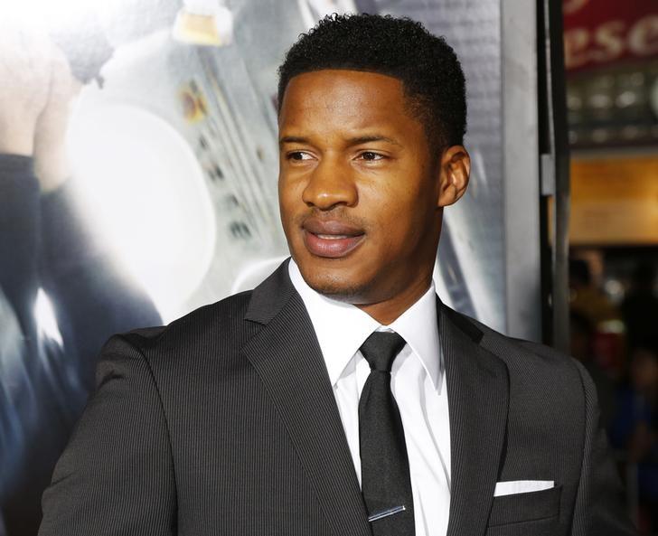 Actor Nate Parker poses at the premiere of his new film'Non-Stop in Los Angeles California