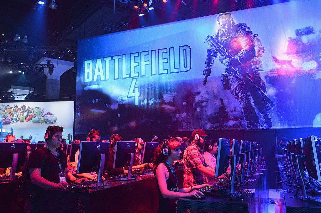 Fans play Battlefield 4 on the opening day at the E3 Gaming and Technology Conference at the Los Angeles Convention Center