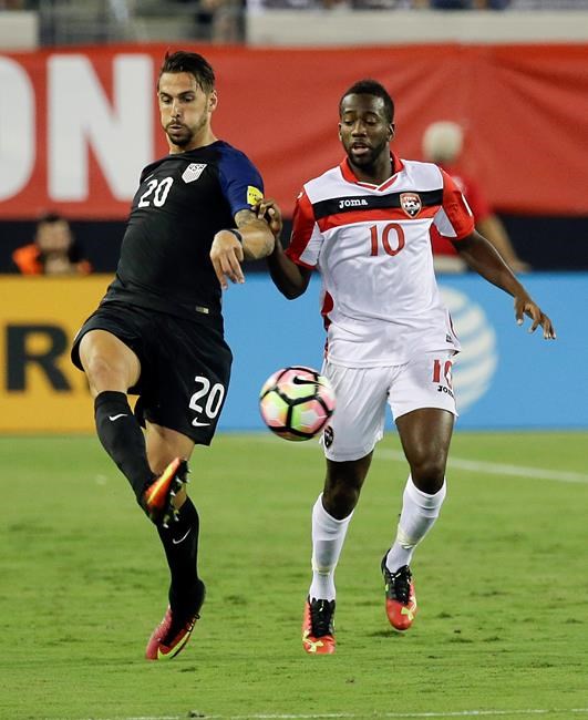 United States&#39 Geoff Cameron moves the ball past Trinidad & Tobago's Kevin Molino during the first half of a CONCACAF World Cup qualifying soccer match Tuesday Sept. 6 2016 in Jacksonville Fla