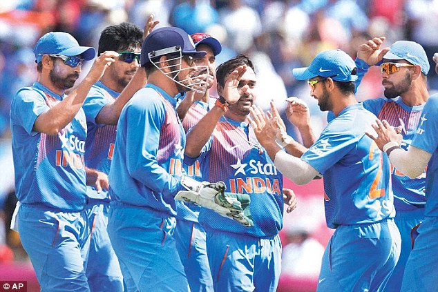 Amit Mishra celebrates the fall of Evin Lewis in Fort Lauderdale