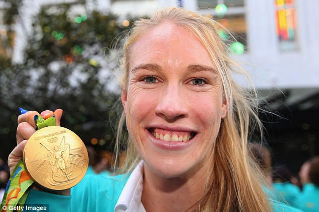 Australia's Kim Brennan shows off her 2016 Olympic gold medal in Melbourne after winning the single sculls event in Rio de Janeiro