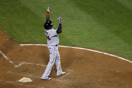 Boston Red Sox's David Ortiz gestures after crossing home plate on a three-run home run in the seventh inning of a baseball game against the Baltimore Orioles in Baltimore Tuesday Sept. 20 2016