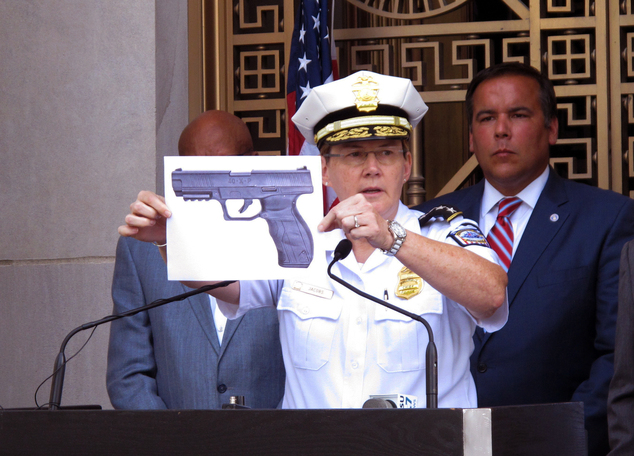 CORRECTS NAME FROM TYREE KING TO TYRE KING-Columbus Police Chief Kim Jacobs holds up