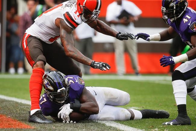 Baltimore Ravens inside linebacker C.J. Mosley catches an interception against Cleveland Browns wide receiver Terrelle Pryor in the final seconds of the second half of an NFL football game Sunday Sept. 18 2016 in Cleveland. The Ravens won 25