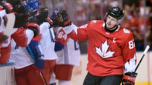 Sidney Crosby receives fist bumps after scoring Canada's opening goal against the Czech Republic on Saturday in the first period of their World Cup of Hockey game in Toronto Ont