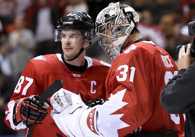 Canada's Sidney Crosby and goalie Carey Price look on before the end of third period World Cup of Hockey action against the Czech Republic in Toronto on Saturday