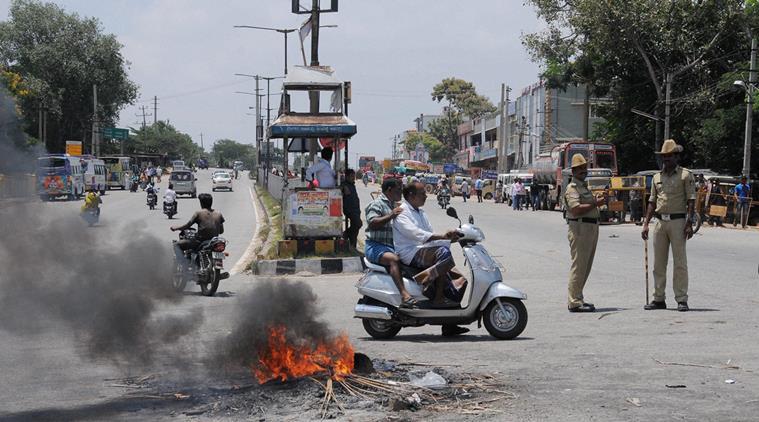 Mysuru A scene at a road following a protest by Kannada activists against the Supreme Court's verdict on Cauvery water issue in Mysuru on Thursday. Credit PTI