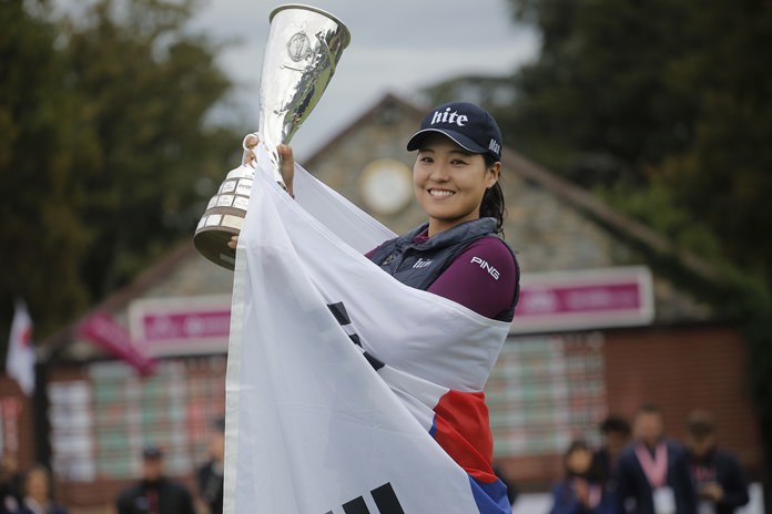 In Gee Chun of South Korea celebrates with her trophy after winning the Evian Championship women's golf tournament in Evian eastern France Sunday Sept. 18