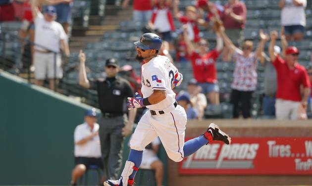 Texas Rangers&#039 Rougned Odor rounds the bases on his three-run home run against the Seattle Mariners in the eighth inning of a baseball game Wednesday Aug. 31 2016 in Arlington Texas. Delino De Shields and Jurickson Profar scored on the hit in the