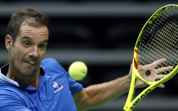 France's Richard Gasquet returns the ball to Croatia's