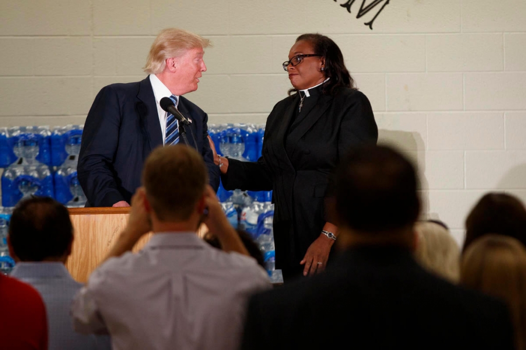 The Latest: Flint mayor unhappy about Trump visit