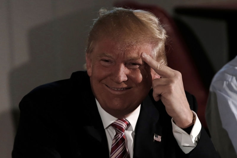 Republican presidential nominee Donald Trump smiles as he meets with local labor leaders and union members during a campaign stop in Brook Park Ohio