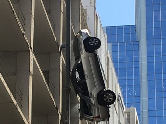 Car Dangling From Austin Parking Garage