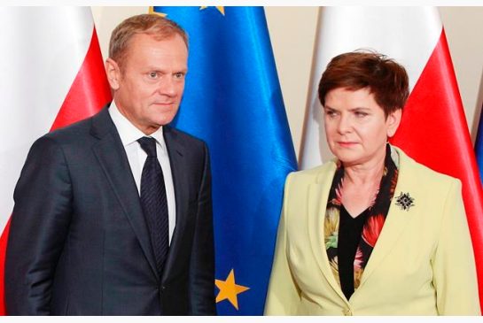 Poland's Prime Minister Beata Szydlo,right greets European Council President Donald Tusk prior to talks on EU future after Britain leaves in Warsaw Poland Tuesday Sept. 13 2016. Ahead of EU summit on Friday Szydlo says EU needs deep bold reforms