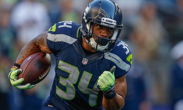 SEATTLE WA- AUGUST 18 Running back Thomas Rawls #34 of the Seattle Seahawks warms up prior to the game against the Minnesota Vikings at Century Link Field