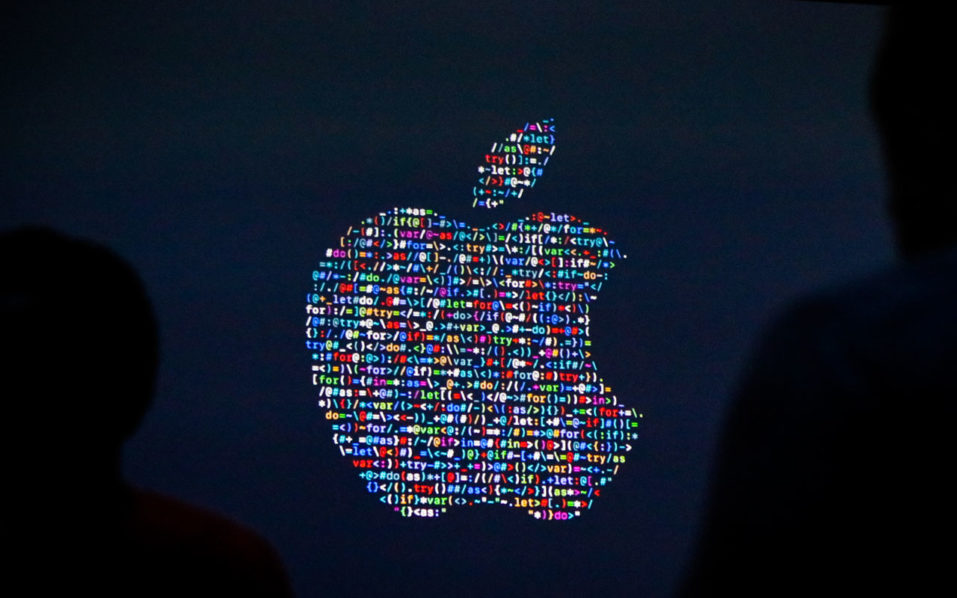 13 2016 shows the Apple logo displayed on a screen at Apple's annual Worldwide Developers Conference presentation at the Bill Graham Civic Auditorium in San Francisco California. Apple logo AFP