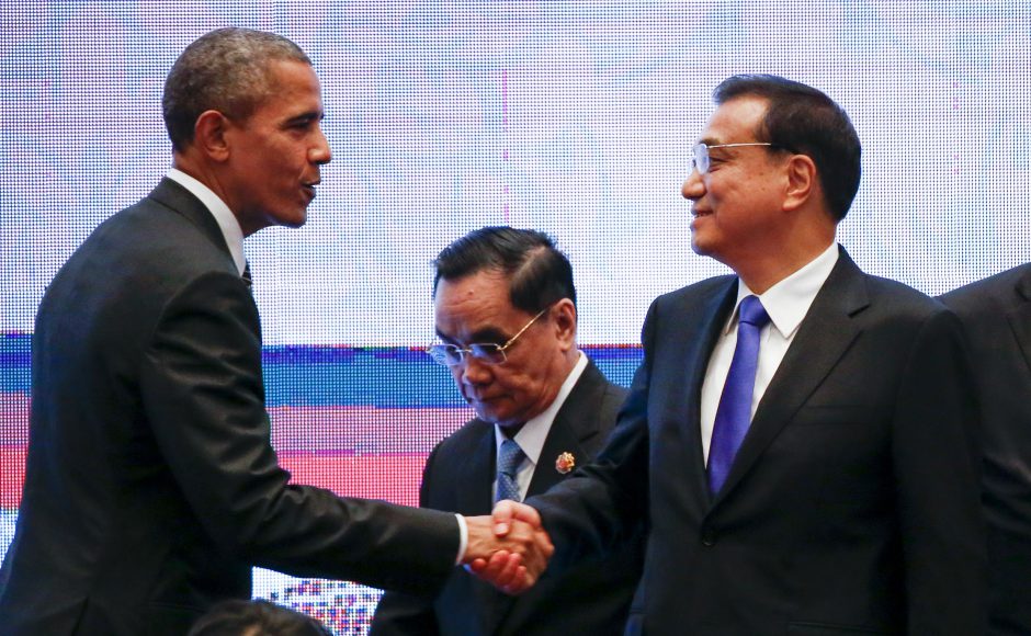 File pic of U.S. President Barack Obama shaking hands with Chinese Premier Li Keqiang at the 27th Asean Summit in Malaysia. Pic AP