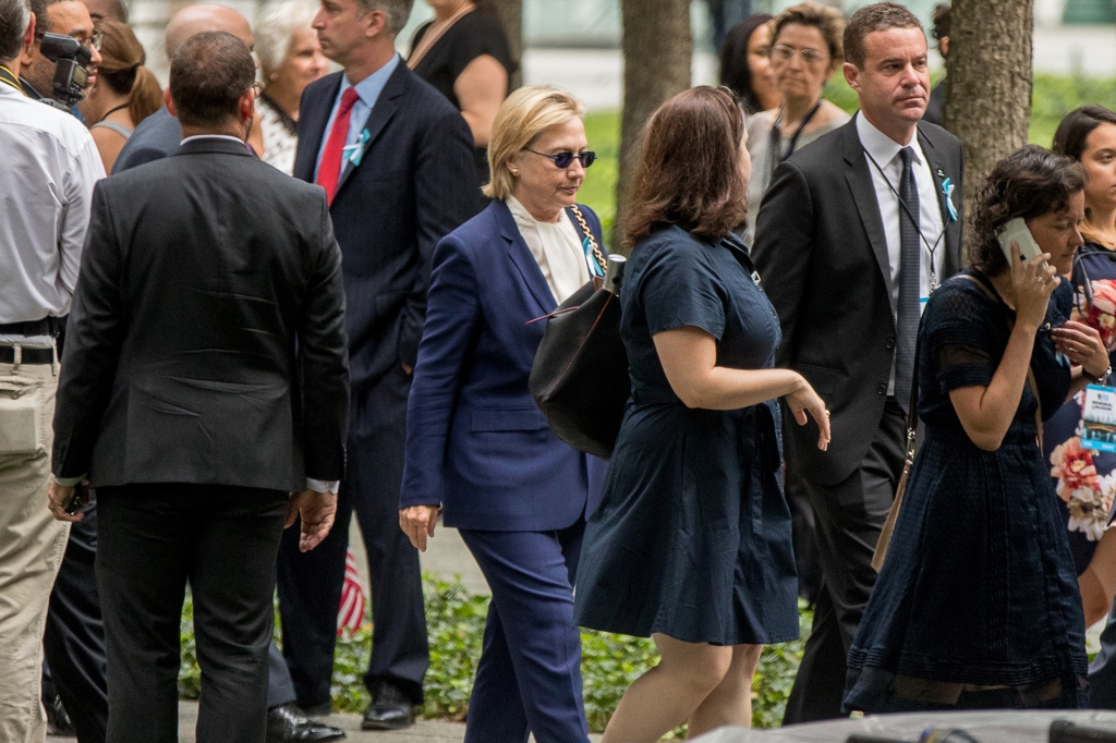 Democratic presidential candidate Hillary Clinton arrives to attend a ceremony at the National September 11 Memorial in New York Sunday Sept. 11 2016 on the 15th anniversary of the Sept. 11 attacks