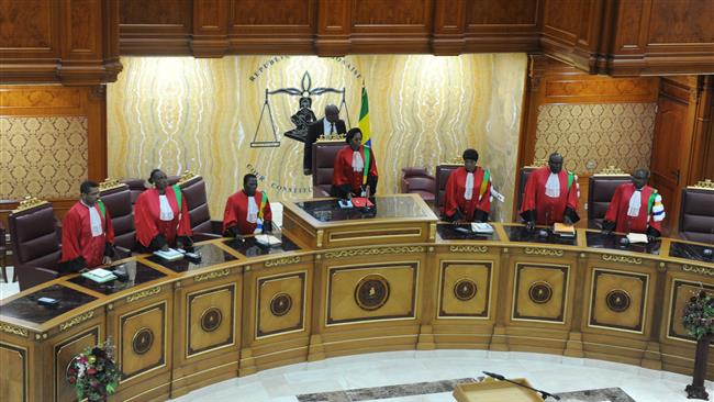 President of the Gabonese Constitutional Court Marie Madeleine Mborantsuo takes her seat ahead of a hearing at the Constitutional Court in the capital Libreville