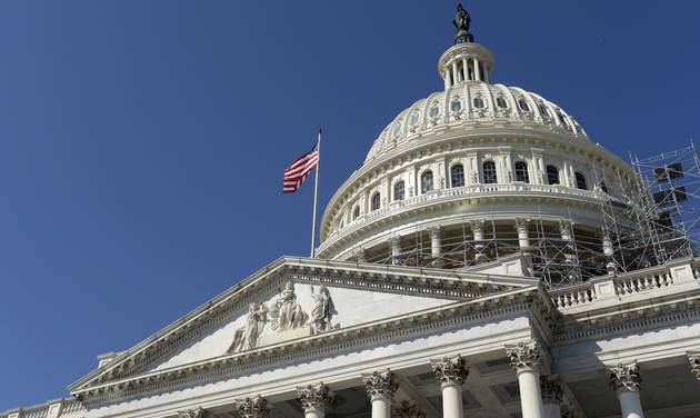 American flag flies over Capitol Hill in Washington. A group of six Gulf Arab countries expressed'deep concern Monday over a bill passed by the U.S. Congress that would allow families of Sept. 11 vic