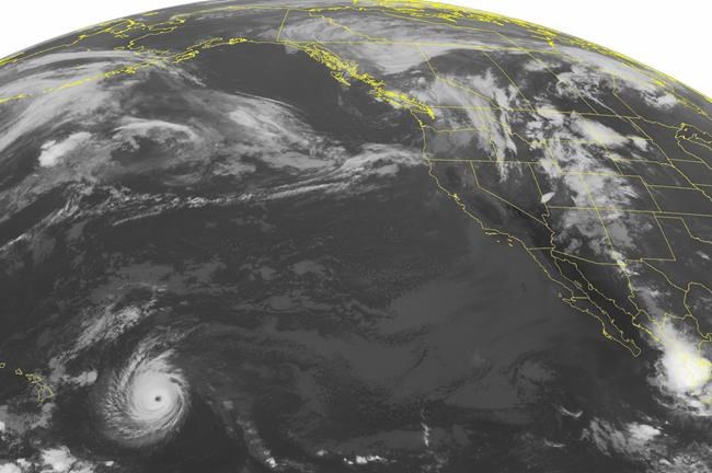 01:00 AM EDT shows a clear eye associated with Hurricane Lester as it continues to move westward towards Hawaii. A band of showers has moved inland through the Pacific Northwest making its way