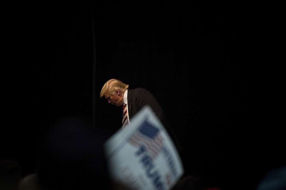 FILE- Donald Trump the Republican presidential nominee exits the stage after speaking at a campaign event at the Seven Flags Event Center in Clive Iowa Sept. 13 2016. Trump on Wednesday gave a small window into some of the results from his most rece