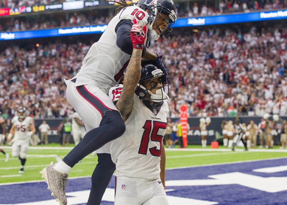 11 September 2016 Houston Texans wide receiver De Andre Hopkins and Houston Texans wide receiver Will Fuller celebrate the touchdown scored in the fourth quarter during the NFL game between the Chicago Bears and Houston Texans at NRG Stadium