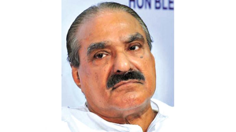 K.M. Mani