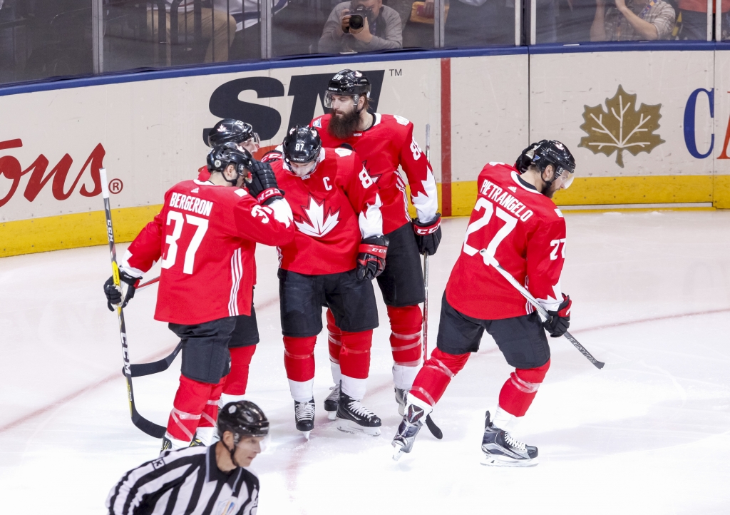 TORONTO ON- SEPTEMBER 27 Brad Marchand #63 of Team Canada is congratulated by his teammates after scoring a goal against Team Europe during Game One of the World Cup of Hockey final series at the Air Canada Centre