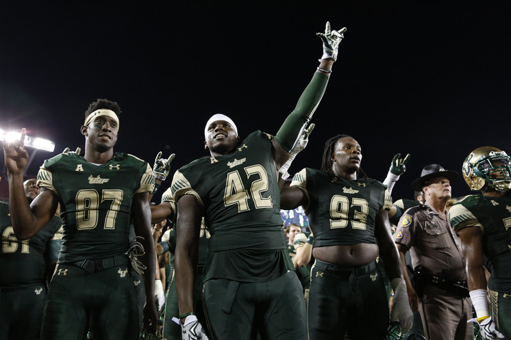 USF players salute the student section following a blowout win over Florida A&M in September