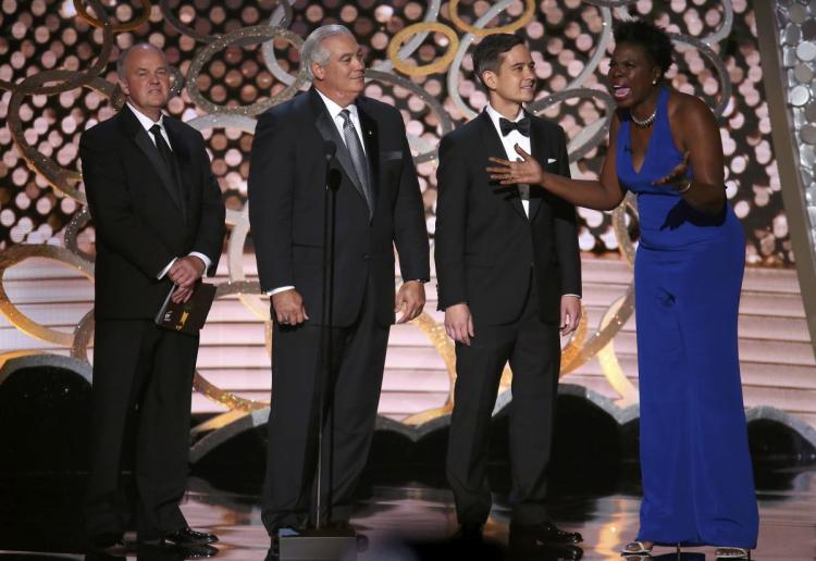 Comedienne Leslie Jones asks the accountants from Ernst & Young to protect her social media accounts like they protect the Emmy secrets during the 2016 awards